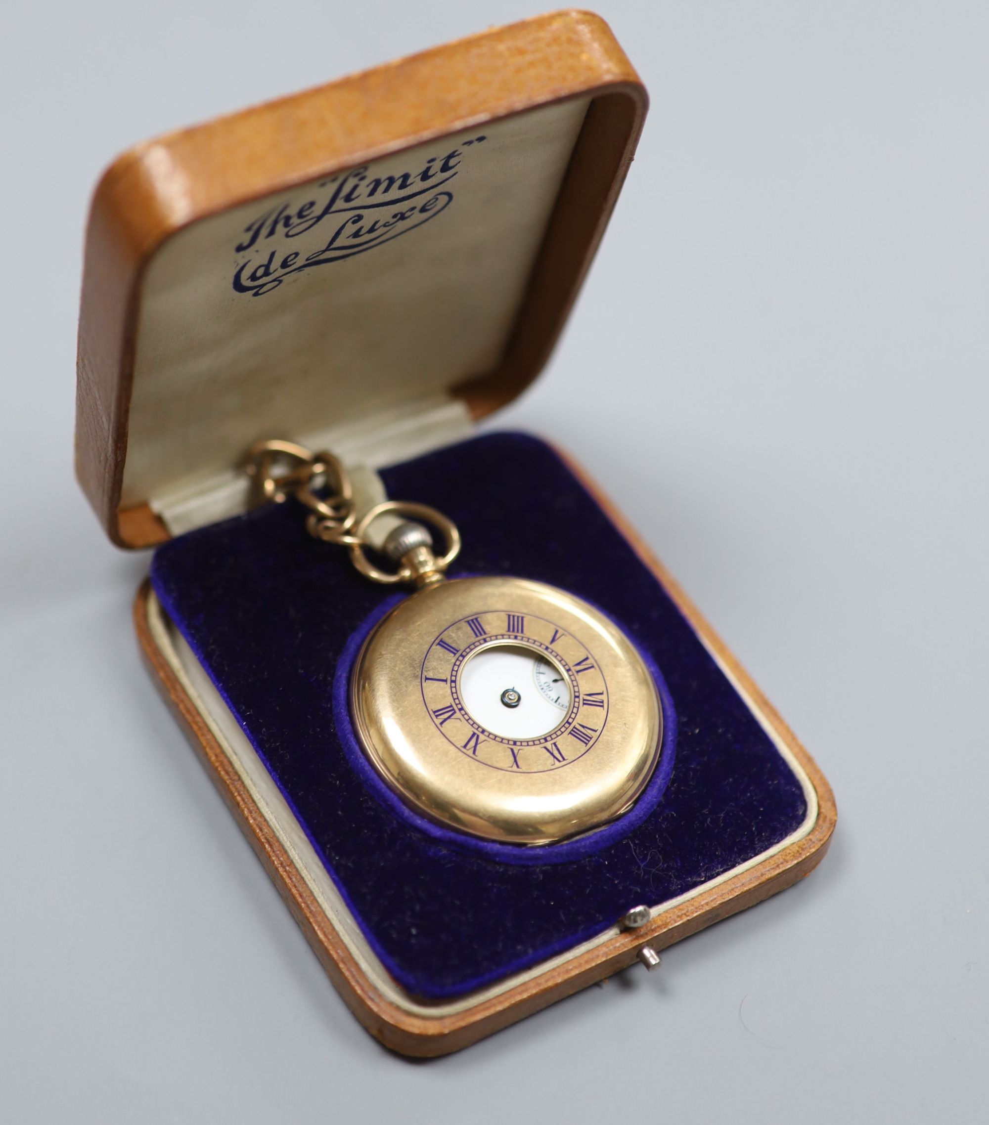 A George V 9ct gold Waltham half hunter pocket watch, with a 9ct gold albert.